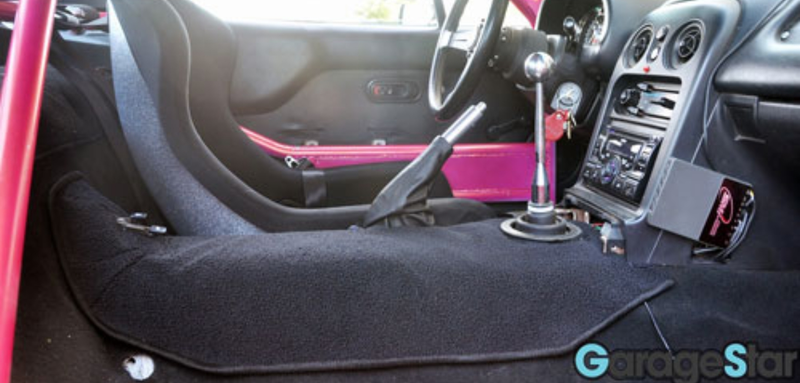 A block off plate for the center console is included so I have no idea why they took product photos without it.